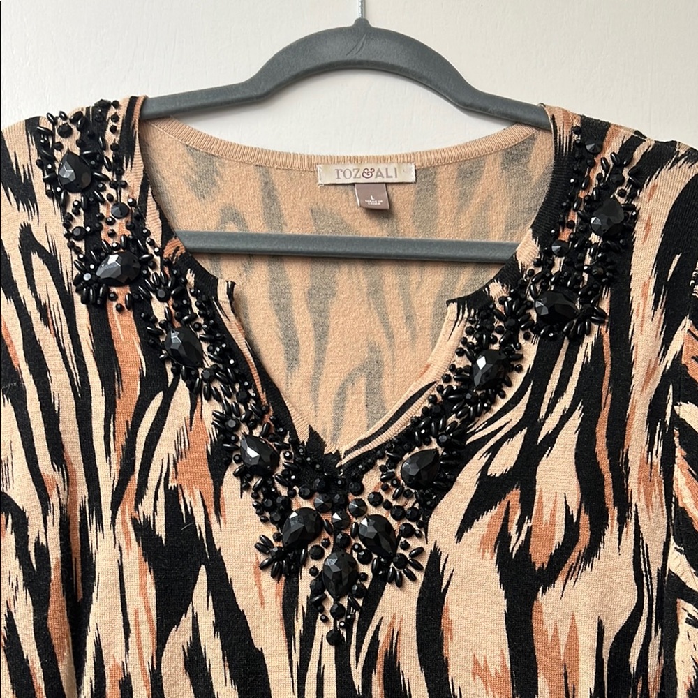 Vibrant Animal Print V-Neck Top with Beaded Accents